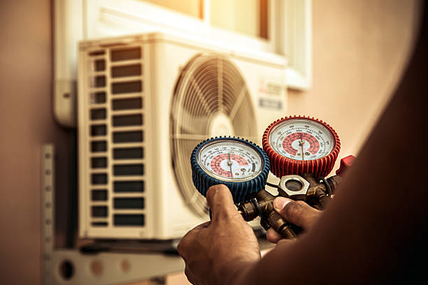 Professional Air Conditioning Service technician working in Crofton, MD
